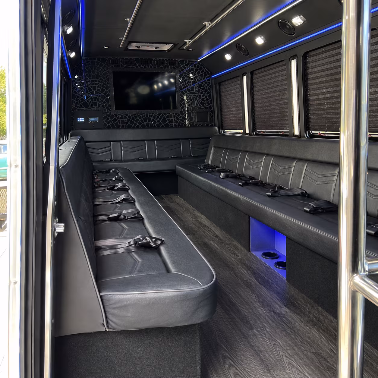 Group beside a Mercedes Sprinter limo in Columbus