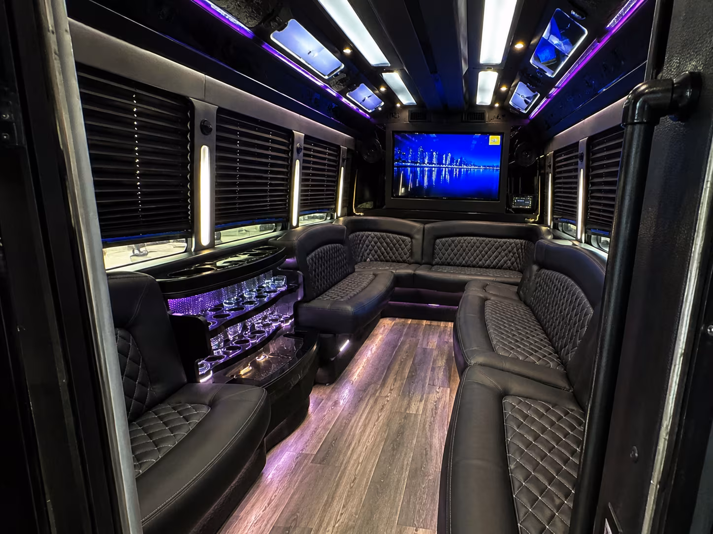Wedding guests seated inside a party bus serving Columbus